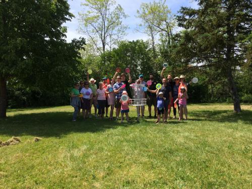  Participants of all ages enjoying a round of disc golf at Haliburton House 